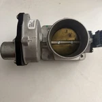Genuine Ford Throttle Body 9W7Z-9E926-A. Fixed Price $195.95.