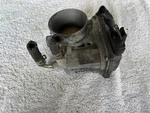 Genuine Throttle Body Valve EA-A60-01 For 2013-2019 Nissan Frontier. Fixed Price $24.00.