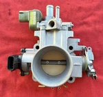 Genuine Throttle Body For 1991-1995 Toyota Previa 2.4L 4CYL 2TZFE # 22210-76021. Fixed Price $195.00.