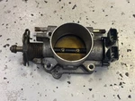 Nissan RB25DET Series Throttle Body And Tps Genuine Oem = Tested 16118-0V100. Fixed Price $150.00.