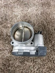 16 Porsche Cayenne Throttle Body 3.6L, Vin (5TH Digit, Turbo). Fixed Price $170.00.
