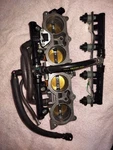 Honda CBR600RR 2007-2012 Fuel Injectors / Throttle Bodies 16400-MFJ-A01 GQ64CA. Fixed Price $90.00.