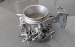 Very Nice Used Original Genuine Porsche 911S Cis Throttle Body 1976-77. Fixed Price $150.00.